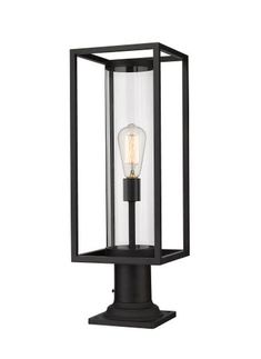 an outdoor post light with a clear glass cover and black metal frame, on a white background