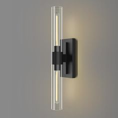 a black wall light with two lights on the side and one light on the back