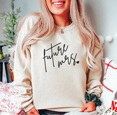 Future Mrs Sweatshirt, Mrs sweatshirt, Future Mrs Shirt, Bride to Be Shirt, Engaged Fiancee Sweatshirt, Wifey sweatshirt, Bride Sweatshirt ★ My products are high quality, clean, bright, accurate color, and soft material for outstanding finished garments ★ A great gift for yourself or your beloved ones on Birthday, Halloween, Thanksgiving, Christmas, New year, Father's day, Mother's day, Anniversary day, Valentine, Music events, etc. ★ How To Order ★ Please include the design color you would like Bride To Be Sweatshirt, Bride Merch, Fiancee Sweatshirt, Engaged Sweatshirt, Bride To Be Shirts, Valentine Music, Engagement Shirt, Wifey Sweatshirt