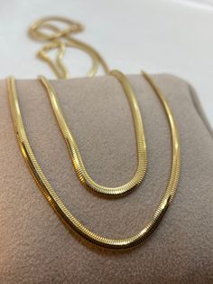 "18k Gold Herringbone Necklace,19.5\" ,2.60 mm , 7.76 gr 18k Gold Herringbone Necklace,16\" ,2.60 mm , 6.50 gr 14k Gold Herringbone Necklace,19.5\" ,2.60 mm , 5.90 gr 14k Gold Herringbone Necklace,16\" ,2.60 mm , 4.84.gr 100% Real Gold Necklace Flat Snake Necklace - Herringbone Charm - Gold Snake Charm - Traveler Herringbone Pendant ▪️ A beautiful herringbone necklace made out of 18K or 14k Solid Real Gold. Available only in yellow gold! Premium lobster Hook for added safety! Priced to sell! Com Yellow Gold Plated Herringbone Necklace With Box Chain, Gold Plated Yellow Gold Herringbone Necklace With Box Chain, Yellow Gold Herringbone Necklace With Box Chain, Yellow Gold Plated Herringbone Necklace With Gold Chain, Gift Yellow Gold Herringbone Necklace With Delicate Chain, Yellow Gold Herringbone Necklace With Delicate Chain As Gift, Yellow Gold Herringbone Necklace With Delicate Chain, Gift Delicate Herringbone Necklace In Yellow Gold, Delicate Yellow Gold Herringbone Necklace Gift