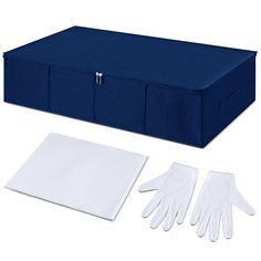 a blue storage box with white gloves and napkins next to it on a white background