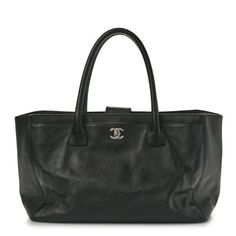 This is an authentic CHANEL Calfskin Cerf Executive Shopper Tote in Black. This is a stylish tote, crafted of grained calfskin leather in black. The shoulder bag features tall rolled leather top handles, optional shoulder strap, deep rear, and front-facingpockets, and a polished silver Chanel CC turn lock. This opens to a black fabric interior with zipper pockets. Shopper Tote, Leather Top, Black Fabric, Zipper Pocket, Calf Skin, Shoulder Strap, Zipper, Chanel, Handbags