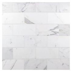 a white marble tile wall that looks like it has been made out of different types of tiles