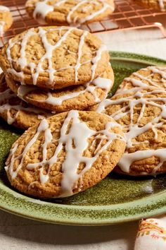 cookies with white icing on a green plate