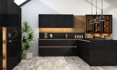 a modern kitchen with black cabinets and wood accents on the countertops, along with potted plants