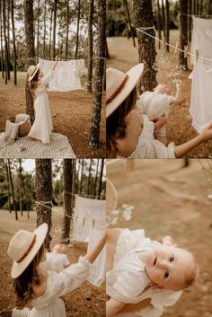 a woman holding a baby in the woods