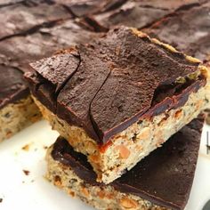 chocolate and peanut butter bars stacked on top of each other