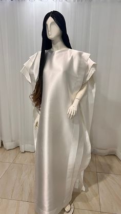 This Silk Kaftan maxi dress is made with Polysilk and Lace Front. It can be styled in different ways, you can dress it up with high heels or dress down with flats/sneakers. The Hand can be worn in 2 ways. one way shows off the arm, the 2nd way has the arm covered for modesty. Notice the slits.Other prints are also available, kindly start a conversation to ask for more information and pics.Contact us for custom looks and more style options. Sizing 🌺 Your height or desired kaftan length is needed Long Satin Maxi Dress For Summer, Chic White Full-length Dress, Spring Long Satin Maxi Dress, Full Length Dresses With Side Slits For Spring, Full-length Spring Dresses With Side Slits, White Full-length Maxi Dress For Spring, Ankle-length Evening Dress, Elegant Ankle-length Maxi Dress For Wedding, Spring Evening Full-length Maxi Dress