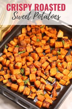 a pan filled with cooked sweet potatoes on top of a counter