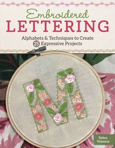 an embroidered letter is shown in front of a pink flowered background with the words embroiderying alphabets and techniques to create impressive projects