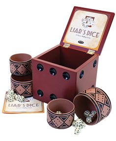 a box with dices and cards in it