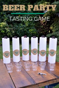 the beer party tasting game is set up on a picnic table