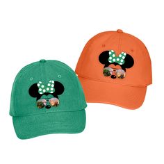 Disney hat/ Minnie Mouse sunglasses hat/ Disney World parks baseball hat / Disney vacation Minnie bow silhouette hat featuring a Minnie Mouse silhouette with green polkadot bow and sunglasses with Epcot, Tree Of Life, Hollywood Studios Tower Of Terror and Cinderella’s castle reflection. This classic cotton twill cap is unstructured and adjustable, offering versatility and lightweight comfort.• cotton • 6 panel, unstructured• 6 sewn eyelets• 6 rows of stitching on bill• Pre-curved bill• Self fabr Disney Adjustable Baseball Cap, Adjustable Disney Baseball Cap, Adjustable Minnie Mouse Cap, Disney Adjustable Cap, Adjustable Disney Cap, Fun Mickey Mouse Themed Hat One Size Fits Most, Fun Mickey Mouse Hat, Adjustable Mickey Mouse Fun Hat, Bow Silhouette