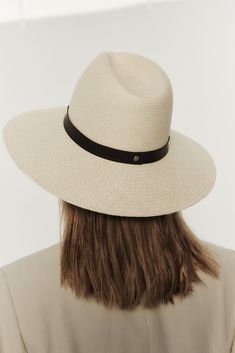 Details Gloria is handwoven by skilled artisans in Ecuador from natural, water-resistant toquilla straw, and finished with trim and detail locally in the USA. Its tall crown makes for a comfortable and face-elongating fit, and its wide brim provides sun-shielding capabilities. · Brim: 4"· Crown: 4.5"· 3/4" Espresso Leather Band· UPF 45+ Fit Runs true to size. If between sizes, we suggest sizing up. Tall Crown, Janessa Leone, Straw Fedora, Straw Handbags, Wardrobe Edit, Weaving Process, Wide Brimmed, Black Bird, Natural Dyes