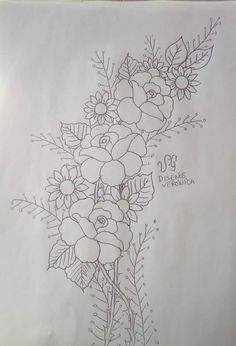 a drawing of some flowers on a piece of paper