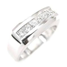 a white gold ring with princess cut diamonds