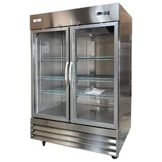 a stainless steel double door refrigerator with glass doors