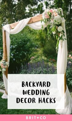 a wedding arch with flowers on it and the words backyard wedding decor hacks written below