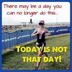 a woman running in a race wearing a pink hat and black tank top that says, there may be a day you can no longer do this today