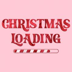 the words christmas loading are red and white on a pink background, with an arrow pointing to