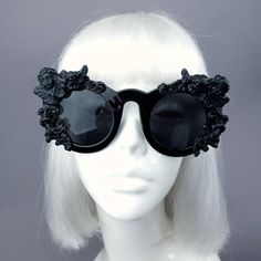 Hand-decorated black filigree ornate sunglasses decorated with cherubs. Please note: There is no ready-made sunglasses box large enough for these sunglasses. There sunglasses are wearable art and need to be treated with due care. While i have taken every possible care to make them sturdy, throwing them in a bag careless may damage them. Treat them as you would a precious thing... Measurements: Inner arm to arm: 14cm Total width 16cm Weight: 60g Thank you in advance for not PM'ing me to haggle ov Black Gothic Sunglasses For Party, Gothic Black Sunglasses For Party, Vintage Black Sunglasses For Festival, Sunglasses Decorated, Gothic Couture, Dark Beauty Magazine, Gothic Bride, Sunglasses Box, Summer Goth