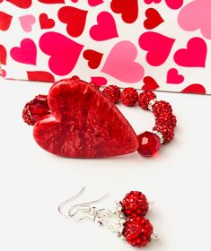 "Rhinestone bead bracelet and earrrings are perfect for that special occasion or as a fun Valentine's Day gift for her. This large heart beaded jewelry set is sure to make a shining statement! Heart beaded bracelet and earrings * Valentines day gift for her * Heart Size:  1.5\" H x 1.5\" W  * Bracelet Length 6.75 inches, Message for a different length * Matching red glitter earrings included * Jewelry set will be shipped next business day MORE HEART JEWELRY https://www.etsy.com/shop/MiksJewelryS Heart-shaped Beaded Bracelet For Valentine's Day, Adjustable Heart-shaped Beaded Bracelets For Valentine's Day, Valentine's Day Heart-shaped Adjustable Beaded Bracelets, Red Heart-shaped Bracelets For Valentine's Day, Valentine's Day Heart-shaped Stretch Bracelet With Colorful Beads, Heart Jewelry Set, Red Beaded Bracelet, Gift Sets For Her, Creative Diy Gifts