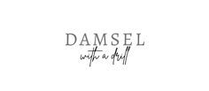 a black and white photo with the words damsel written in cursive writing