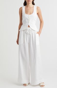 An elasticized drawstring waist comfortably tops these flowy wide-leg pants made from lightweight linen designed to get softer with each wear. Elastic/drawstring waist 100% linen Hand wash, dry flat Imported Framing Square, Flowy Wide Leg Pants, Linen Vest, Men Home Decor, Hairstyling Products, Fragrance Cologne, Baby Gear Essentials, Rollerball Perfume, Wide Leg Linen Pants