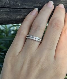 "A two tier half-eternity band featuring pave-set genuine sparkling shimmering White Topaz is a unique women's wedding band or April birthstone ring. Wrapped in a box ready for gift-giving. (r-egt-101) Size 5 ---> Don't know your ring size? Purchase our ring sizing gauge https://www.etsy.com/listing/290720637/ring-sizer-ring-sizing-gauge-multisizer?ga_search_query=ring+sizer&ref=shop_items_search_1 *Follow us @instagram for promotions *LIKE* us on Facebook http://www.facebook.com/Belesas Stackable Double Band Diamond Promise Ring, Diamond Double Band Stackable Rings, Anniversary Stackable Rings With Pave Setting, Stackable Double Band Diamond Ring For Wedding, Stackable Double Band Diamond Wedding Ring, Diamond Stackable Eternity Band For Promise, Double Band Stackable Diamond Wedding Ring, Stackable Double Band Diamond Ring, Wedding Rings With Diamond Accents And Double Band