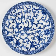 a blue and white plate with an intricate design