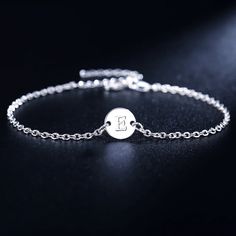 SPECIFICATIONSBrand Name: ALIZEROBracelets Type: Charm BraceletsMain Stone: noneOrigin: Mainland ChinaCertificate: noItem Weight: 7Metals Type: silverMetal Stamp: 925,SterlingGender: UnisexOccasion: partyFine or Fashion: FineStyle: Office/careerItem Type: BRACELETSCertificate Type: NGTCis_customized: NoMetal Stamp: 925,SterlingBrand Name: ALIZEROChoice: yessemi_Choice: yes 925 Sterling Silver 26 Letter Women Men Chain Bracelet Anklet Charm Wedding Personality Jewelry Lady Gift PartyMetal:silver .Stamped:925 .size: length about 20+4cm Silver Minimalist Anklets For Gift, Personalized Silver Anklets, Elegant Silver Name Bracelet With Adjustable Chain, Personalized Adjustable Silver Anklets, Silver Minimalist Anklets For Party, Silver Round Name Bracelet For Formal Occasions, Silver Anklets With Adjustable Chain As Gift, Silver Dainty Anklets For Wedding, Silver Party Anklets