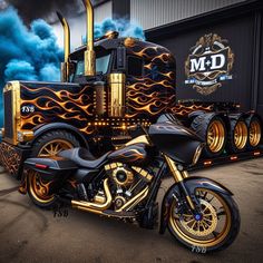 a black and gold motorcycle with flames on it's side parked in front of a building