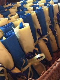 many blue and white wrapped gifts in wicker baskets