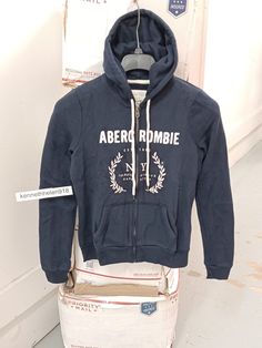 NEW ABERCROMBIE & FITCH WOMENS APPLIQUE LOGO GRAPHIC HOODIE SWEATSHIRT NAVY BLUE MEDIUM NEW WITH TAG 100% Authentic Guarantee WOMENS TOPS & DRESSES A&F  (XS - L) A&F  (SIZED) BUST  (INCHES) BUST  (CM) ITALY EU UK JAPAN KOREA CHINA XXS 00 32 81 38 32 4 - 6 3 - 160/80A XS 00 - 0 32 - 33 82 - 84 40 34 6 - 8 5 - 7 44 160/84A S 2 - 4 34 - 35 86 - 89 42 36 - 38 8 - 10 7 - 9 55 165/88A M 6 - 8 36 - 37 91 - 94 44 38 - 40 10 - 12 11 - 13 66 170/92A L 10 - 12 38 - 39 96 - 99 46 40 - 42 14 - 16 13 - 15 77 170/96A XL 14 39 - 40 100 - 102 48 44 18 17 88 175/100A Fall Logo Sweatshirt In Athleisure Style, Logo Hooded Sweatshirt For Fall, Hooded Logo Tops For Fall, Hooded Logo Sweatshirt For Fall, Logo Hoodie For Fall, Hooded Tops With Logo For Fall, Hooded Top With Logo Detail For Fall, Fall Logo Hoodie Tops, Fall Hoodie With Logo