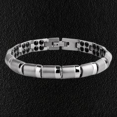 Titanium & Germanium Bracelet Modern Gunmetal Jewelry With Bracelet Strap, Adjustable Gunmetal Stainless Steel Bracelet, Adjustable Gunmetal Stainless Steel Bracelets, Adjustable Stainless Steel Gunmetal Bracelet, Modern Magnetic Bracelet Jewelry, Modern Silver Durable Jewelry, Modern Silver Wristband With Stainless Steel Clasp, Modern Silver Magnetic Bracelets, Modern Silver Magnetic Bracelet