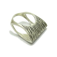 Sterling silver ring. Stamped 925. Approximate weight 9.0 grams. Top width 1.1cm (0.44inches), height 0.9cm (0.36 inches). All our jewels are made from solid sterling silver 925/1000 and are carefully crafted by hand in our family workshop. We dispatch your orders in 5 working days, worldwide and the postage is $5. We ship registered priority mail. Please allow 5-7 working days for delivery in Europe and 10-15 working days outside Europe. For any questions - please do not hesitate to contact me! Silver Sterling Silver Dome Ring With Wide Band, Modernist Silver Dome Ring Open Style, Silver Sterling Silver Engraved Wide Band Ring, Modernist Sterling Silver Open Ring, Silver Open Ring With Unique Design, Modern Handmade Silver Engraved Ring, Silver Open Band Ring With Unique Design, Modernist Silver Signet Ring With Open Design, Modernist Sterling Silver Signet Ring