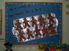 a bulletin board with gingerbread cookies on it