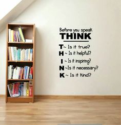 there is a book shelf with books on it and the words before you speak think