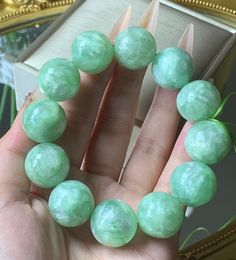 Material: Emerald beads Size：18mm Quantity: 1 strand 6mm approx 29 pcs one strands 7mm approx25 pcs one strands 8mm approx 22 pcs one strands 9mm approx 21pcs one strands 10mm approx 19 pcs one strands 11mm approx 18pcs one strands 12mm approx 16 pcs one strands 13mm approx 16 pcs one strands 14mm approx 15 pcs one strands 15mm approx 14pcs one strands 16mm approx 14 pcs one strands 17mm approx 13pcs one strands 18mm approx 13pcs one strands 19mm approx 12pcs one strands 20mm approx 12pcs one st Green Board, Emerald Bead, Women Bracelet, Bracelet Women, Bracelet Jewelry, Wedding Basket, Womens Bracelets, Beaded Bracelet, Mint Green