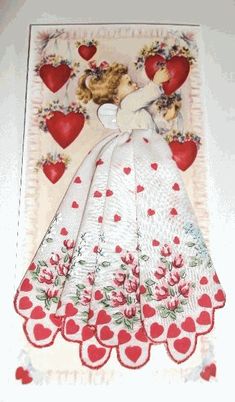 a card with an image of a woman in a white dress and hearts on it