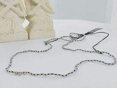 The sparkle and minimal impression of Micro cut Labradorite beads knotted on dark green rope will attract all attention.The silver beads on it are 925 raw silver. This handmade necklace is designed with artistic touches.🌬 💌D E T A İ L S All jewelry are handmade and unique  Minimal Style  Materials: Silver, Labradorite, Ropes Necklace Length:51 cm Chain Style:Knot Chain 📌S T O R A G E  A N D  C A R E   Avoid contact with moisture and perfume . When storing, avoid direct sunlight. Stones may break. Protect from impacts. Undress before bed. ✈️D E LI V E R Y Products will be ready to ship in 1-3 business days. İ can understand and accept cancellations request  before the item is shipped. Buyers are responsible for any customs and import taxes that may apply. I'm not responsible for delays d Adjustable Silver Hand Knotted Necklace, Silver Hand Knotted Adjustable Necklace, Silver Hand Knotted Necklace For Gift, Silver Hand-knotted Necklace For Gift, Adjustable Hand Knotted Lariat Beaded Necklace, Adjustable Hand Knotted Beaded Necklaces For Festivals, Adjustable Hand Knotted Beaded Necklace For Festivals, Aura Necklace, Handmade Gemstone Jewelry