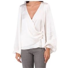 Questions? Leave A Comment Below! Chic Cream Silk Top, Silk Cream Top For Office, Cream Silk V-neck Top, Cream Silk Top For Office, Chic Off White Long Sleeve Blouse, Elegant Off White Long Sleeve Tops, Elegant Off White V-neck Top, Silk V-neck Blouse In Cream, Cream Silk V-neck Blouse