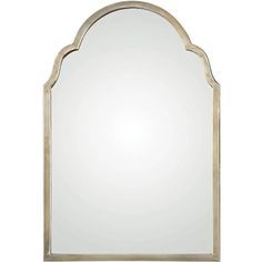 a large mirror with an arched frame