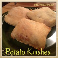 two pastries sitting on top of a green plate with the words potato knishes