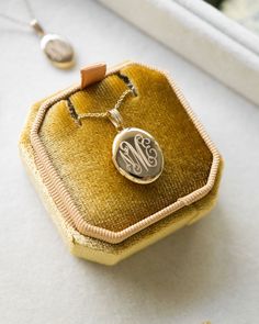 Create a monogram engraving using the first letters of your first, last and middle name. The simulator is just a preview of the monogram style. We will rework the letters so it fits centered on the locket. Classic Photo, Fine Gold Jewelry, Oval Locket, Middle Name, Jewelry Accessories Ideas, Gold Locket, Jewelry Personalized, Gold Monogram, Accessories Ideas