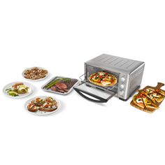 an open toaster oven with several plates of food in front of it on a white background