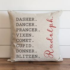 a pillow that has the names of different types of dancers on it, sitting on a wooden floor