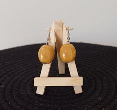 Dangling earrings, with yellow pearl Yellow Single Dangle Earring, Single Yellow Dangle Earring, Elegant Handmade Yellow Earrings, Yellow Pierced Hoop Earrings As Gift, Handmade Yellow Earrings For Gift, Yellow Dangle Earrings For Jewelry Making, Handmade Yellow Drop Clip-on Earrings, Elegant Hypoallergenic Yellow Earrings, Elegant Yellow Handmade Hoop Earrings