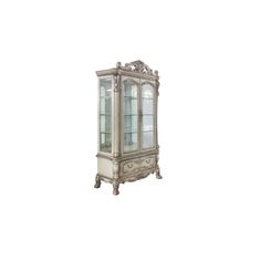 an antique china cabinet with glass doors and carvings on the front, against a white background