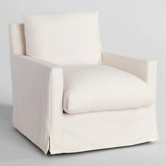 a white chair sitting on top of a gray floor